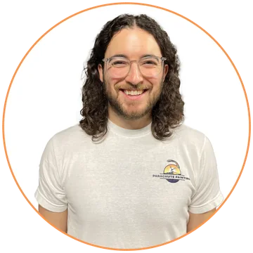 Christian, owner of Parachute Painting, in a Parachute Painting t-shirt
